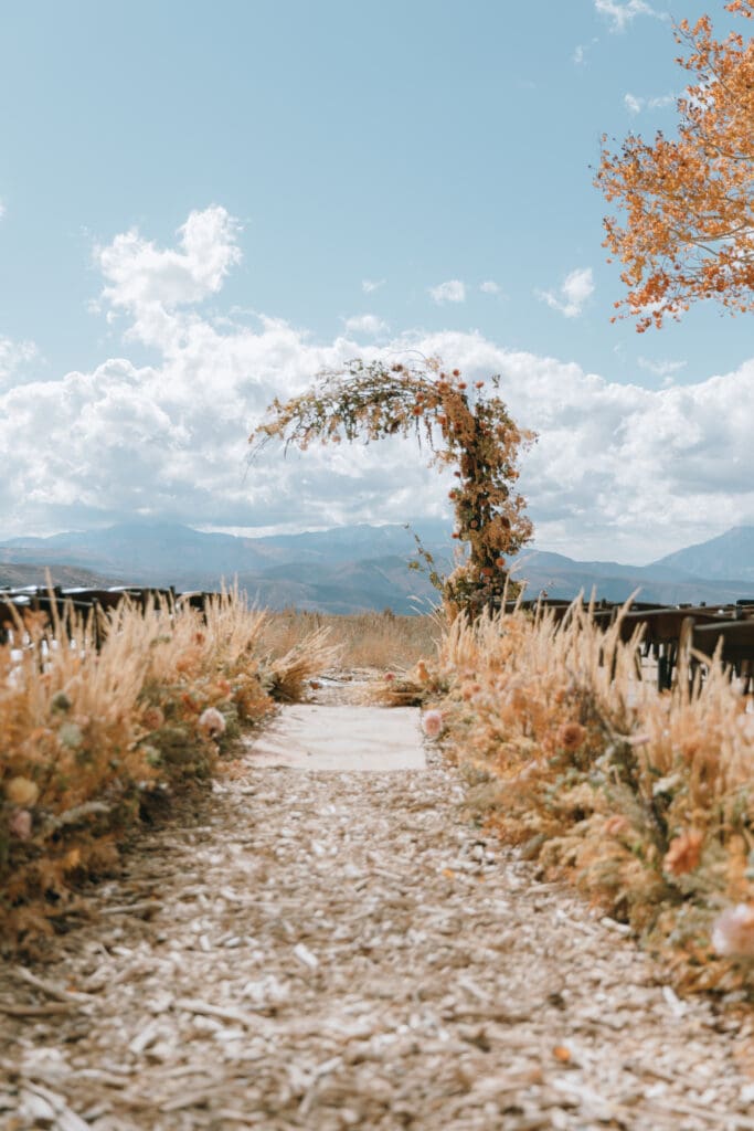 Wolf Creek Ranch ceremony seating overlooking golden aspen groves