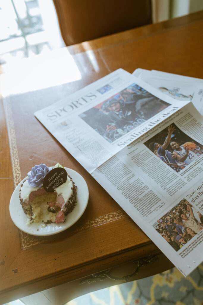 photographer Gabrielle Pellegrino stumbled on a leftover 'Happy Anniversary' cake from the night before — an unplanned find that became the centerpiece of the couple's Sunday morning celebration