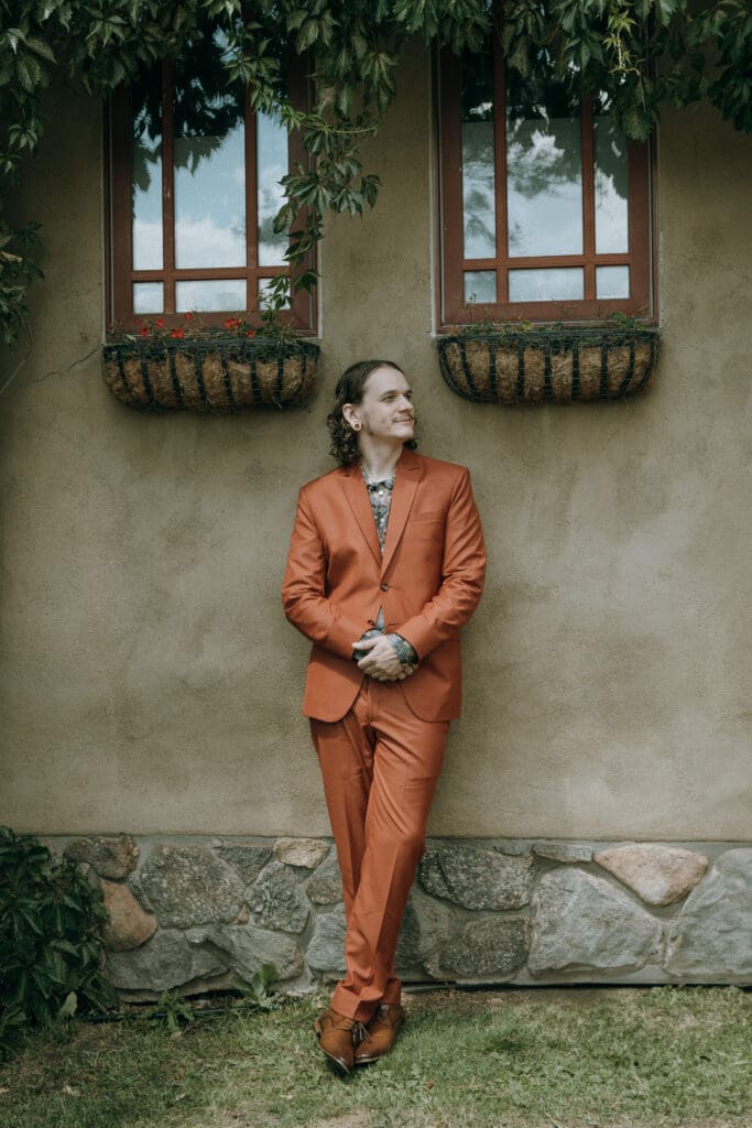 solo groom anxiously awaits to see his bride for the first time