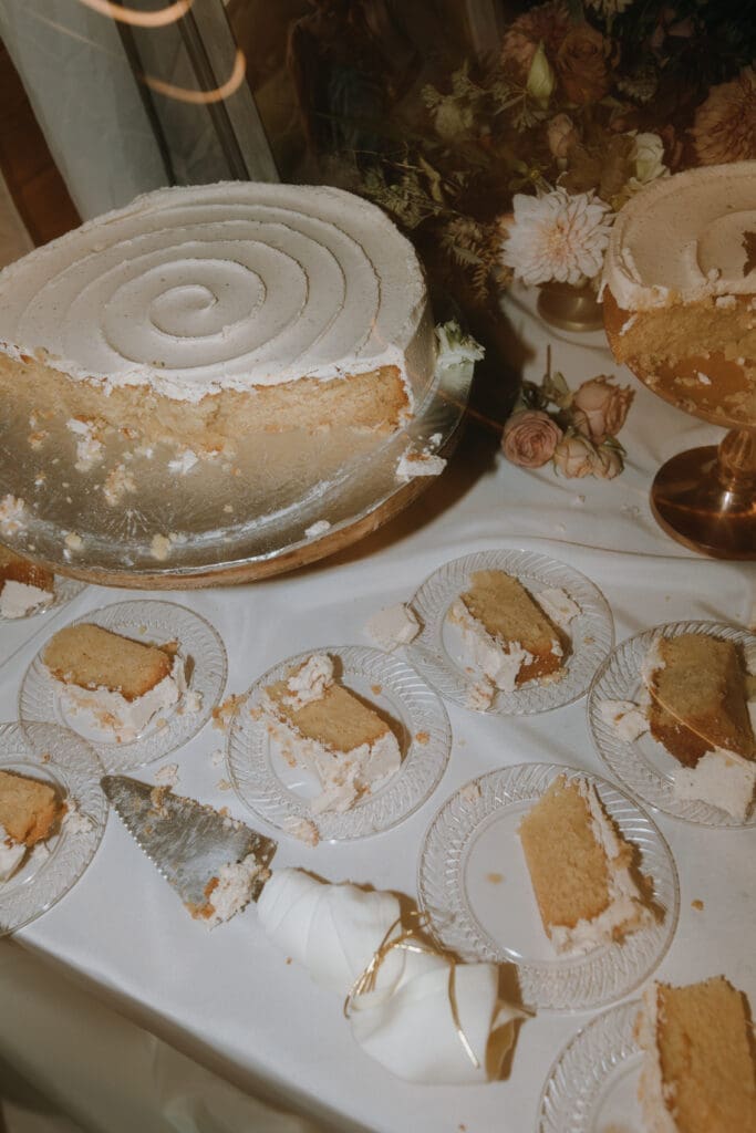 Autumn wedding cake with burgundy frosting and gold accents by Tulie Bakery