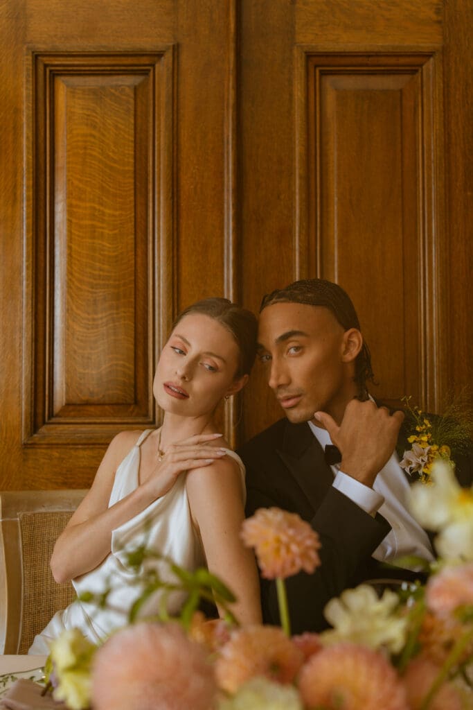 Couple portrait in Let Them Eat Cake Marie Antoinette luxury wedding editorial by Gabrielle Pellegrino Photography